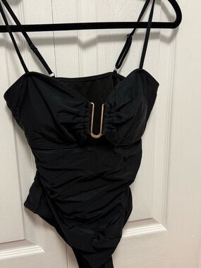 Black One-Piece Swimsuit with Gold Accent